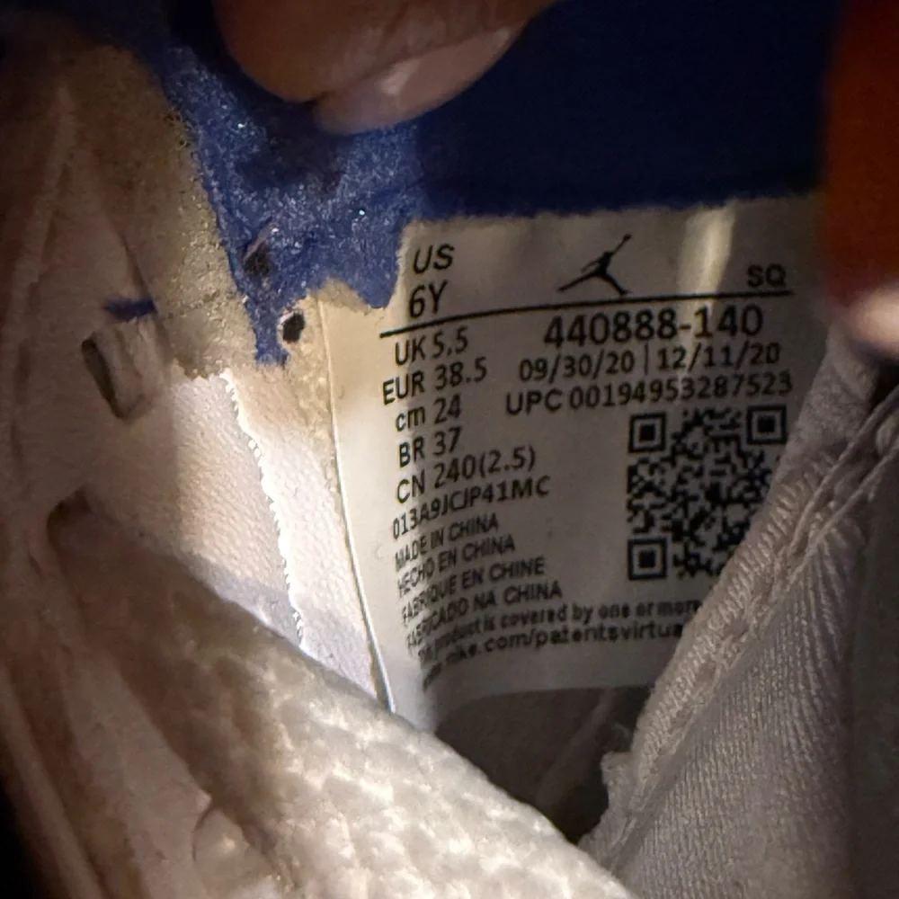 Jordan White and Blue Retro 5 Sneakers